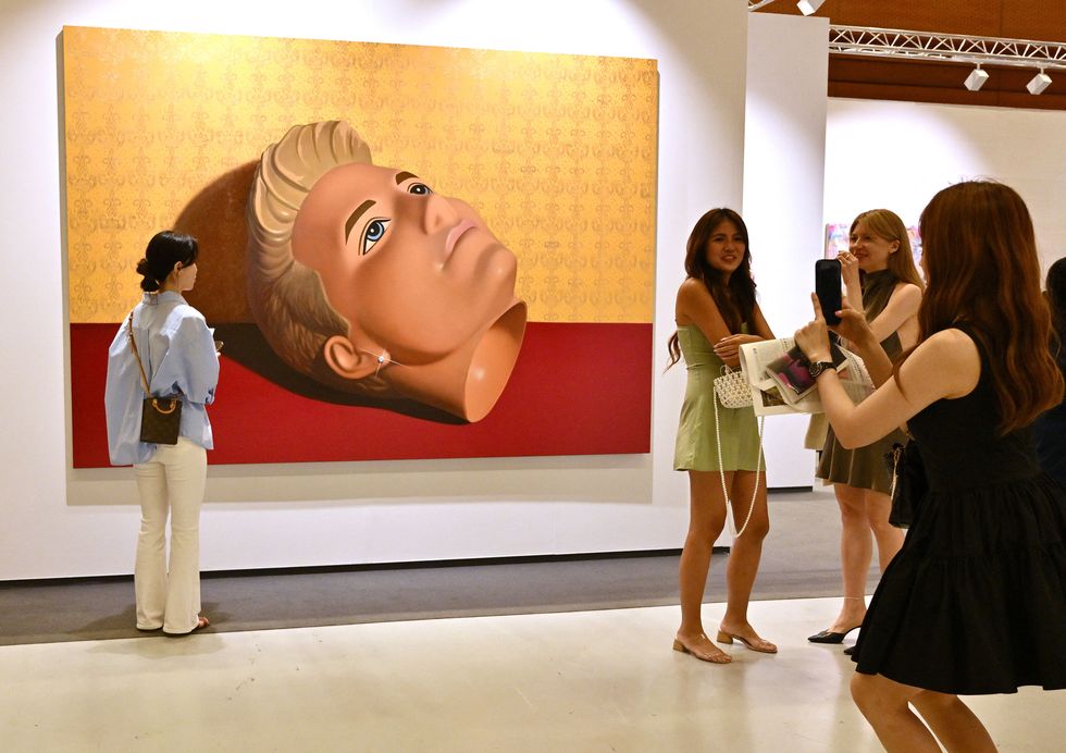 visitors look at an artwork named ken, 2023 by artist sun yitian during the frieze seoul 2023 art fair in seoul on september 6, 2023 photo by jung yeon je afp restricted to editorial use mandatory mention of the artist upon publication to illustrate the event as specified in the caption photo by jung yeon jeafp via getty images