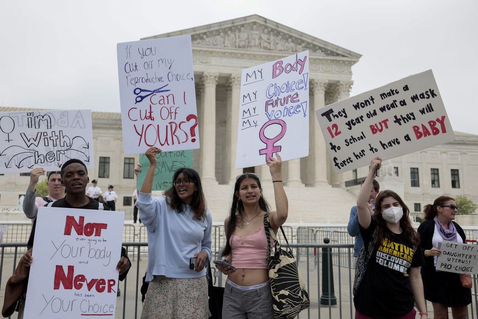 abortion rights advocates demonstrate in front of the us supreme court building on may 04, 2022 in washington, dc