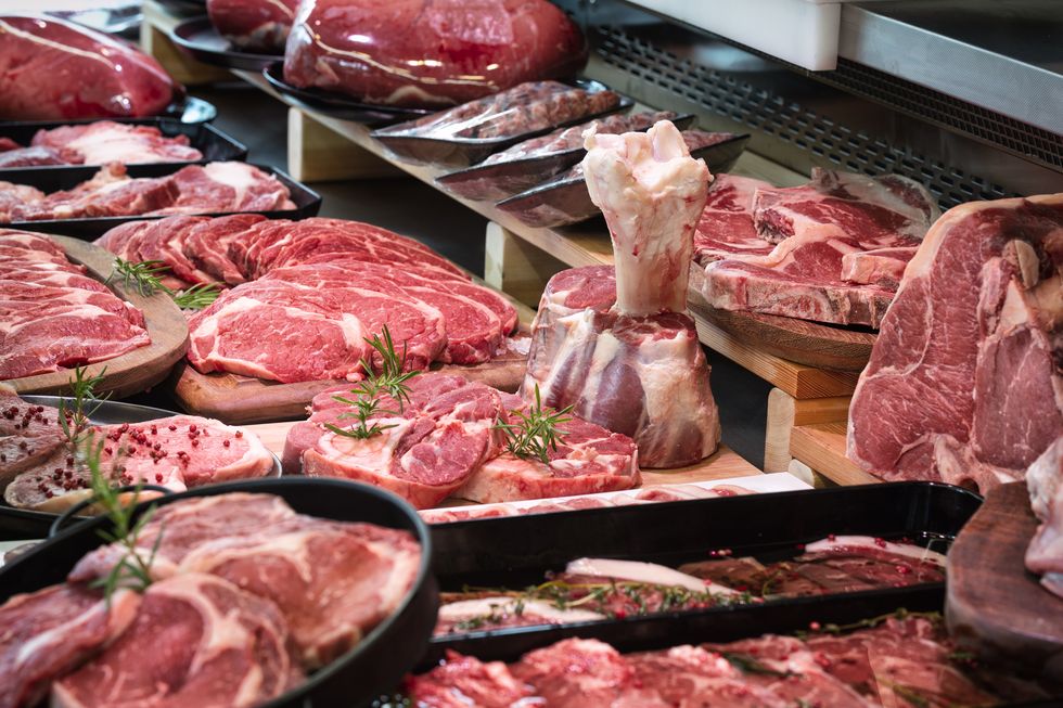 raw meats on butchers shop stock image