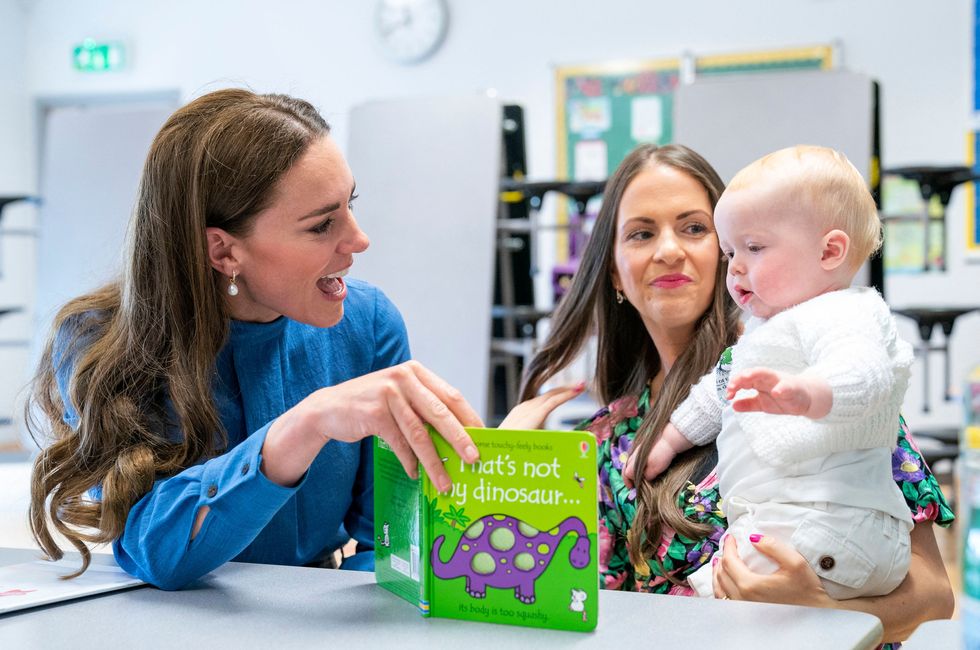 britains catherine, duchess of cambridge l meets laura molloy and her 10 month old son saul molloy during a visit to st johns primary school in glasgow on may 11, 2022 photo by jane barlow  pool  afp photo by jane barlowpoolafp via getty images