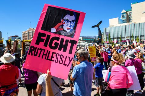 a protester holds a placard about ruth bader ginsburg during the protest people gathered to voice their displeasure with the supreme courts leaked document that likely signals the over turn of roe v wade