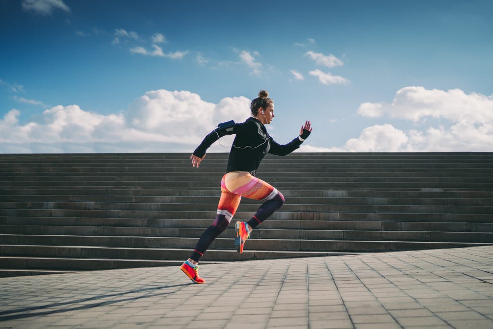 young woman running in barcelona