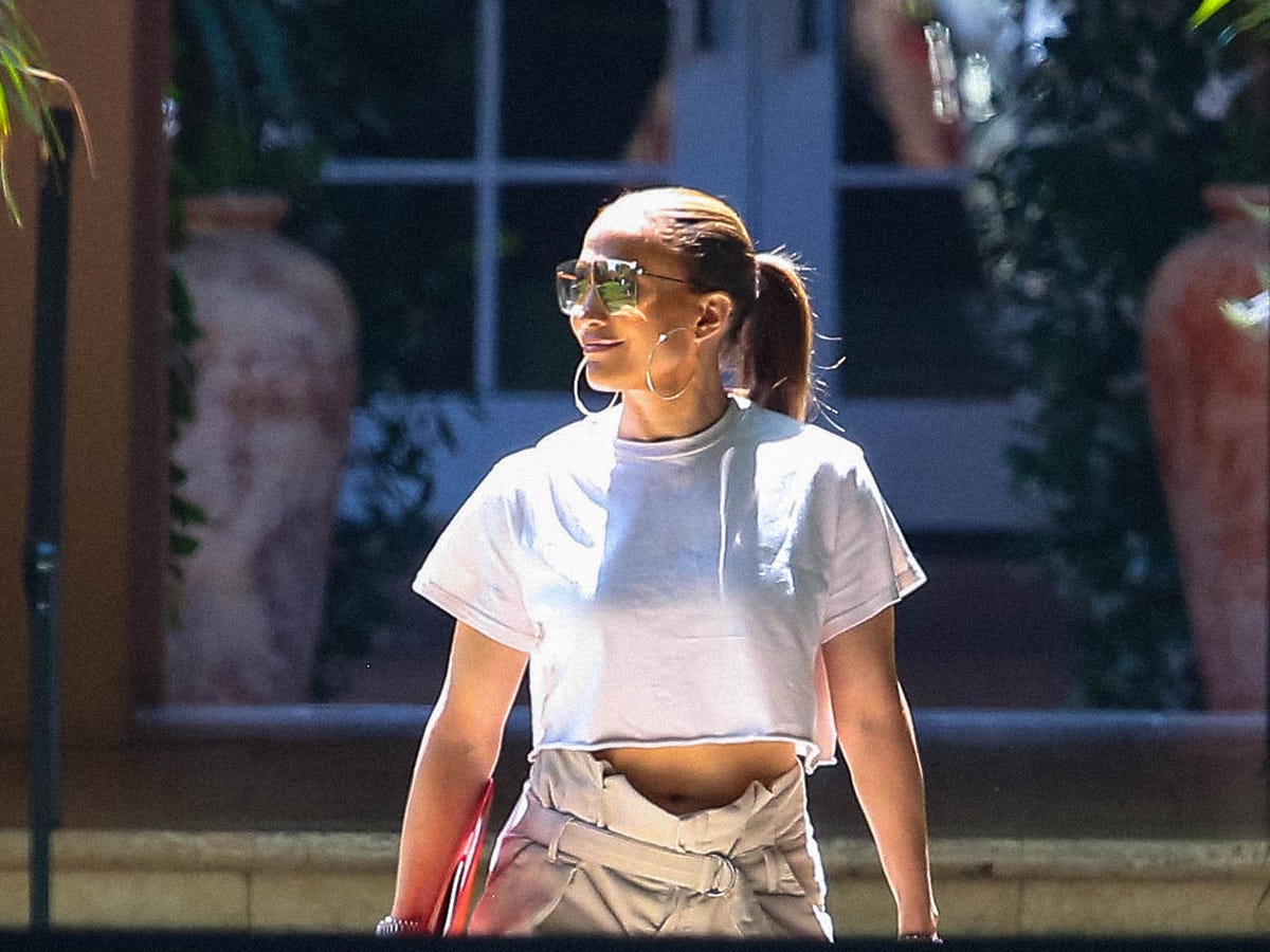 Meghan Markle's All-White Outfit Reminds Us of Jennifer Lopez