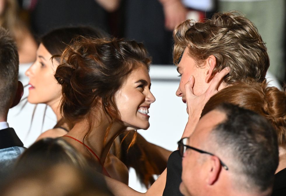 cannes, france may 25 kaia gerber and austin butler depart the screening of elvis during the 75th annual cannes film festival at palais des festivals on may 25, 2022 in cannes, france photo by stephane cardinale corbiscorbis via getty images