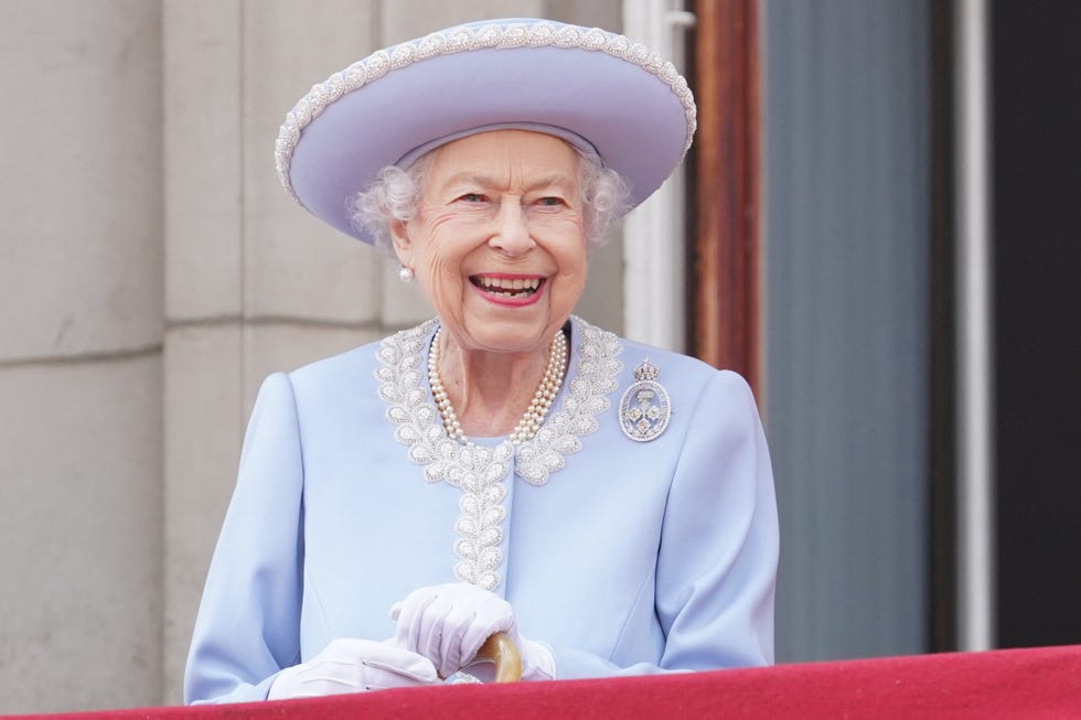 britains queen elizabeth ii stands on the balcony of buckingham palace as the troops march past during the queens birthday parade, the trooping the colour, as part of queen elizabeth iis platinum jubilee celebrations, in london on june 2, 2022   huge crowds converged on central london in bright sunshine on thursday for the start of four days of public events to mark queen elizabeth iis historic platinum jubilee, in what could be the last major public event of her long reign photo by jonathan brady  pool  afp photo by jonathan bradypoolafp via getty images