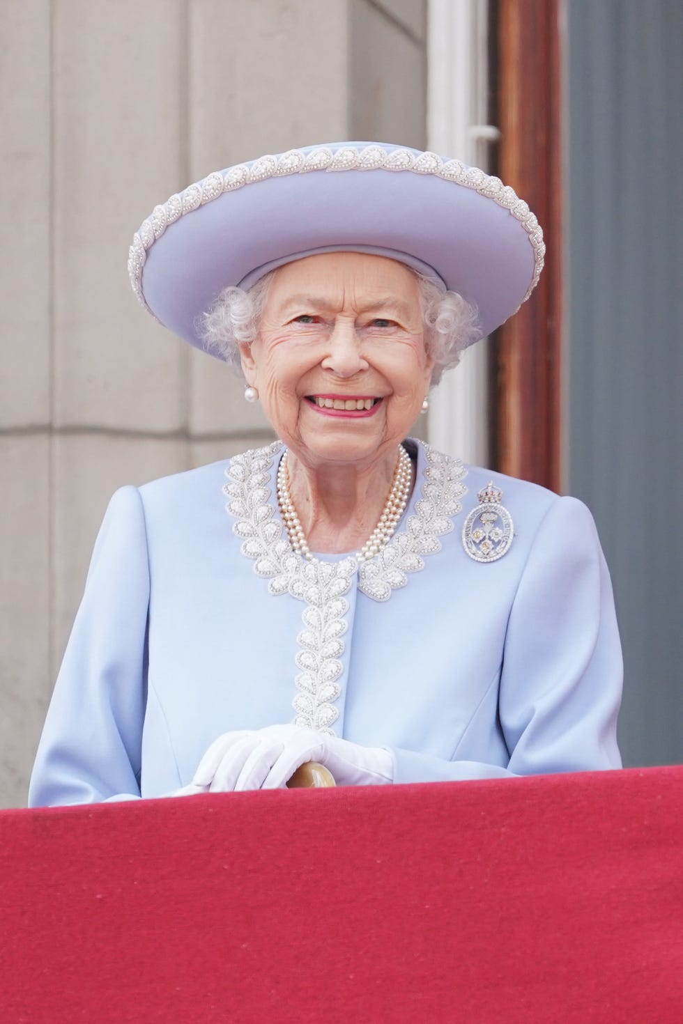 britains queen elizabeth ii stands on the balcony of buckingham palace bas the troops march past during the queens birthday parade, the trooping the colour, as part of queen elizabeth iis platinum jubilee celebrations, in london on june 2, 2022   huge crowds converged on central london in bright sunshine on thursday for the start of four days of public events to mark queen elizabeth iis historic platinum jubilee, in what could be the last major public event of her long reign photo by jonathan brady  pool  afp photo by jonathan bradypoolafp via getty images