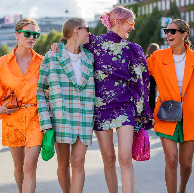 copenhagen, denmark   august 11 annabel rosendahl, tine andrea wearing green checkered oversized blazer darja barannik wearing orange dress, blazer, purple dress seen outside baum und pferdgarten on august 11, 2021 in copenhagen, denmark photo by christian vieriggetty images