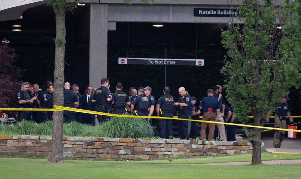 tulsa, oklahoma   june 01  police respond to the scene of a mass shooting on at st francis hospital on june 1, 2022 in tulsa, oklahoma at least four people were killed in a shooting rampage at the natalie medical building on the hospital's campus, according to published reports the shooter is also dead from a self inflicted gunshot wound, according to police  photo by j pat cartergetty images