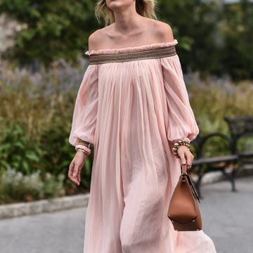 new york, new york   september 09 rebecca laurey is seen wearing a pink dress with brown bag outside the carolina herrera show during new york fashion week ss20 on september 09, 2019 in new york city photo by daniel zuchnikgetty images