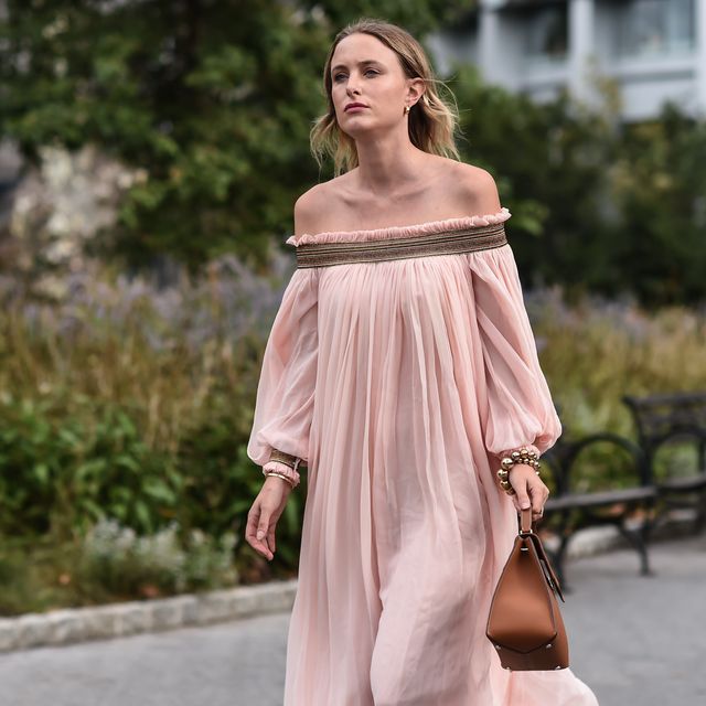 new york, new york   september 09 rebecca laurey is seen wearing a pink dress with brown bag outside the carolina herrera show during new york fashion week ss20 on september 09, 2019 in new york city photo by daniel zuchnikgetty images
