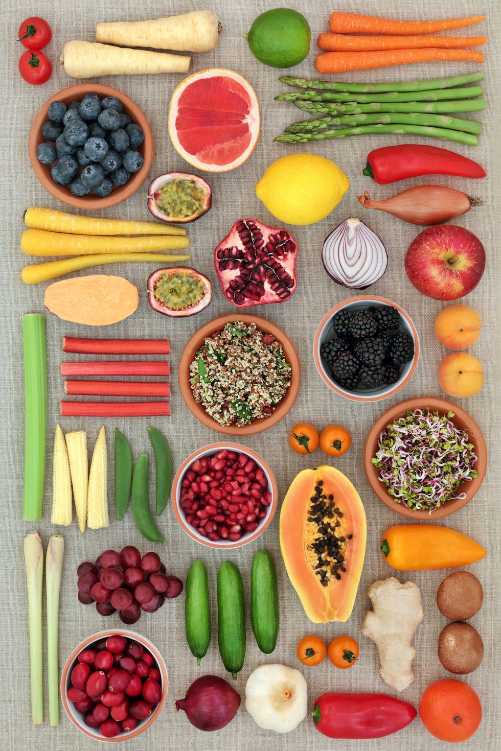 super food concept for healthy eating  with fruit, vegetables and spice with foods high in antioxidants, anthocyanins, dietary fibre and vitamins flat lay