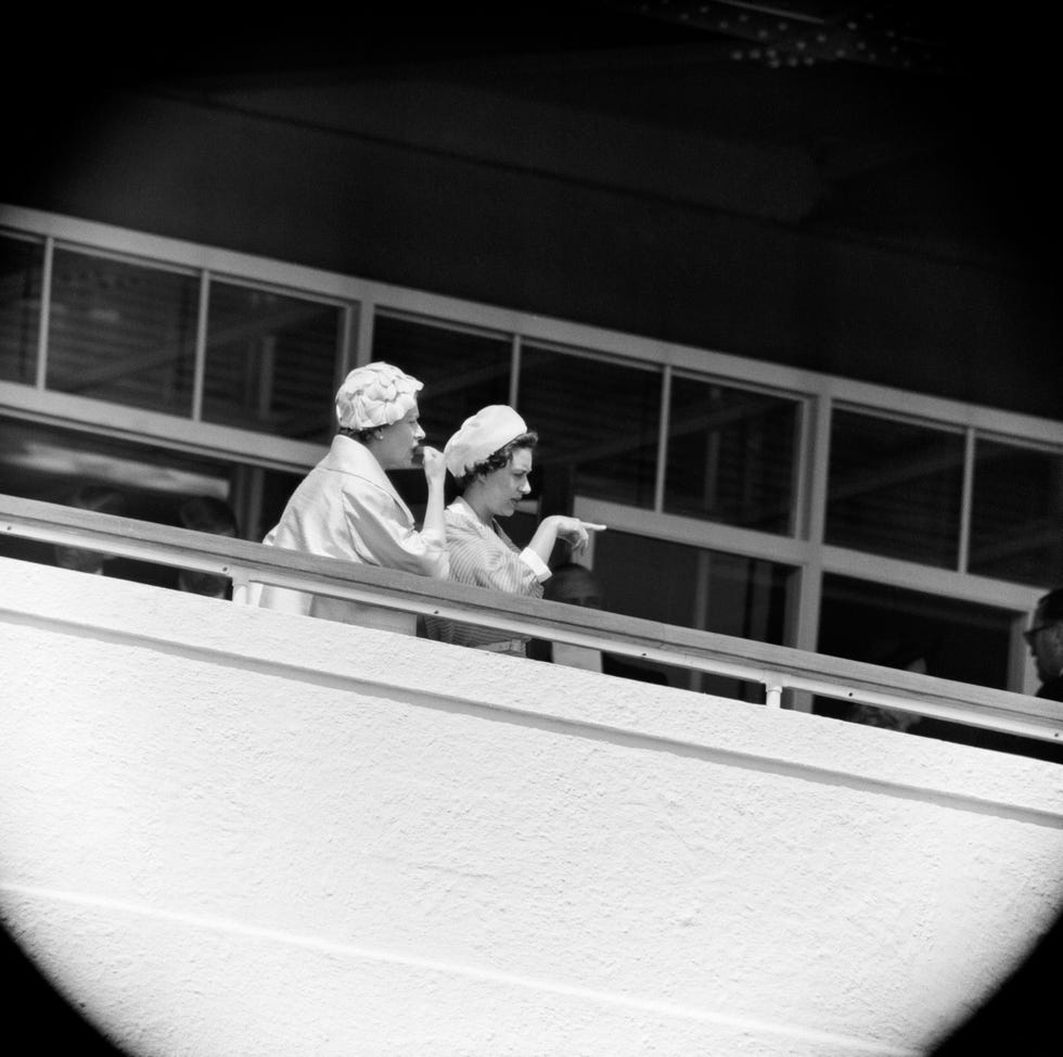 derby day at epsom pictured, queen elizabeth ii and princess margaret watching a race which has the queens colt