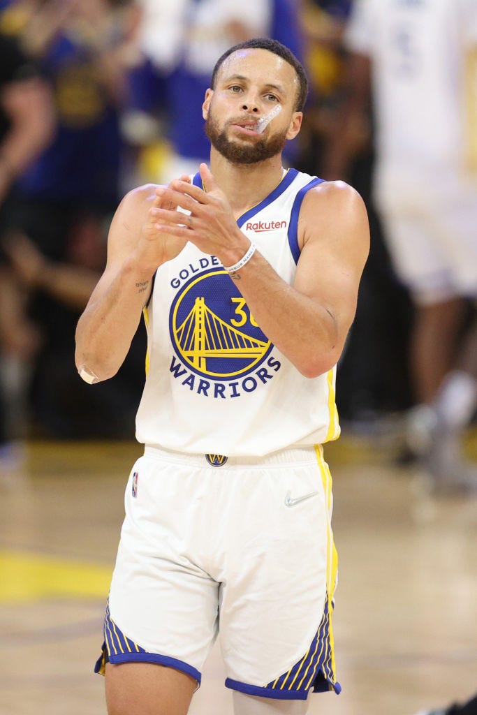 san francisco   june 14 golden state warriors guard stephen curry 30 reacts after teammate guard klay thompson 11 makes a three point basket against the boston celtics golden state warriors during fourth quarter action the boston celtics visited the golden state warriors for game five of the nba finals at the chase center in san francisco, ca on june 13, 2022 photo by matthew j leethe boston globe via getty images