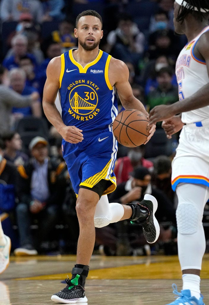 boston   june 10 the warriors stephen curry 30 howled at celtics fans after he hit a three point shot the boston celtics host the golden state warriors in game 4 of the nba finals at td garden in boston on june 10, 2022 photo by jim davisthe boston globe via getty images