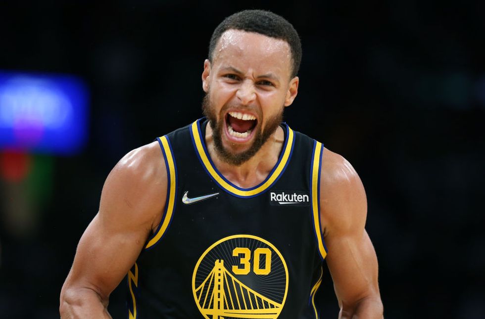 boston   june 10 the warriors stephen curry 30 howled at celtics fans after he hit a three point shot the boston celtics host the golden state warriors in game 4 of the nba finals at td garden in boston on june 10, 2022 photo by jim davisthe boston globe via getty images