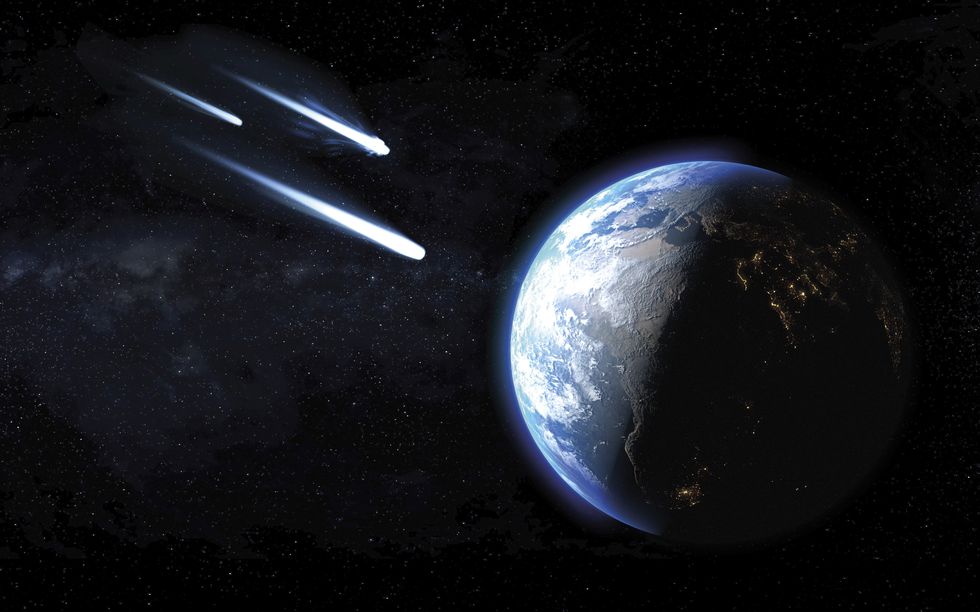three icy comets passing by planet earth, illustration