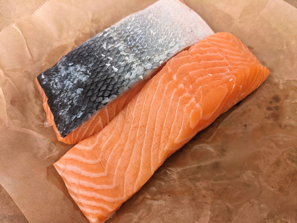 two salmon fillets on butchers paper