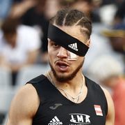 topshot   frances wilfried happio wears a bandage after being assaulted at the warm up stage   during in the mens 400 metre hurdles final during the french elite athletics championships at the helitas stadium in caen, northern france, on june 25, 2022 photo by sameer al doumy  afp photo by sameer al doumyafp via getty images