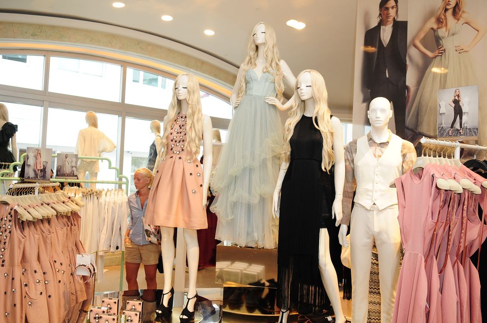 Boutique, Fashion, Mannequin, Fashion design, Display window, Costume design, Dress, Display case, Room, Event, 