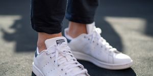 01 july 2019, berlin a visitor of the mercedes benz fashion week wears white sneakers the collections for springsummer 2020 will be presented at berlin fashion week photo monika skolimowskadpa photo by monika skolimowskapicture alliance via getty images
