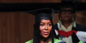 london, england   july 07 naomi campbell officially became dr naomi campbell as she was formally awarded an honorary phd from the university for the creative arts in recognition of her contribution to the global fashion industry the doctorate was presented to her at the graduation of uca epsom students at the royal festival hall on july 7, 2022 in london, england for the ceremony, naomi wore a burberry biscuit colour wool tailored jacket with orange lapels, waistcoat, and a beige jumpsuit, with biscuit colour leather boots make up by pat mcgrath labs photo by david m benettdave benettgetty images for burberry  outside org