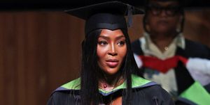 london, england   july 07 naomi campbell officially became dr naomi campbell as she was formally awarded an honorary phd from the university for the creative arts in recognition of her contribution to the global fashion industry the doctorate was presented to her at the graduation of uca epsom students at the royal festival hall on july 7, 2022 in london, england for the ceremony, naomi wore a burberry biscuit colour wool tailored jacket with orange lapels, waistcoat, and a beige jumpsuit, with biscuit colour leather boots make up by pat mcgrath labs photo by david m benettdave benettgetty images for burberry  outside org