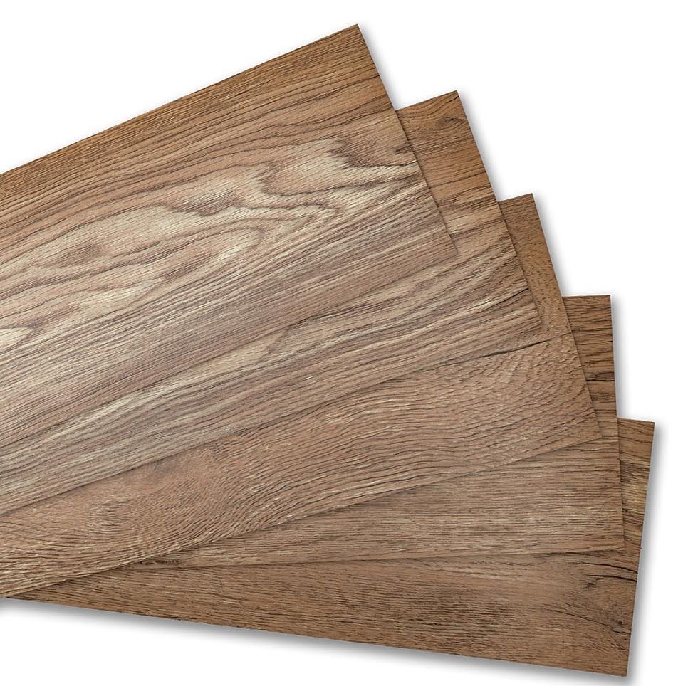 luxury vinyl planks use pictures of real wood to make them almost indistinguishable from the real thing