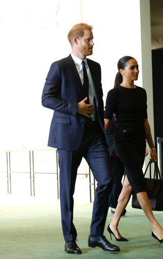 prince harry l, the duke of sussex, and meghan markle r arrive to attend the 2020 un nelson mandela prize award ceremony at the united nations in new york on july 18, 2022   the prize is being awarded to marianna vardinoyannis of greece and doctor morissanda kouyate of guinea photo by kena betancur  afp photo by kena betancurafp via getty images