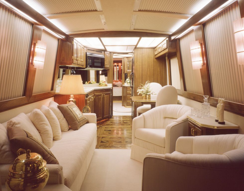 this image is a 40 luxury bus motor home interior view looking from the front to rear