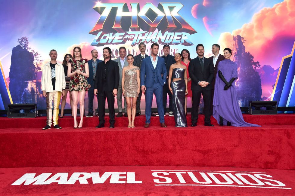los angeles, california   june 23 l r sean gunn, karen gillan, brad winderbaum, head of streaming, television and animation at marvel studios, christian bale, louis desposito, natalie portman, taika waititi, chris hemsworth, kevin feige, president of marvel studios, tessa thompson, victoria alonso, president of physical, post production, vfx and animation at marvel studios, chris pratt and jaimie alexander attend the thor love and thunder world premiere at the el capitan theatre in hollywood, california on june 23, 2022 photo by alberto e rodriguezgetty images for disney