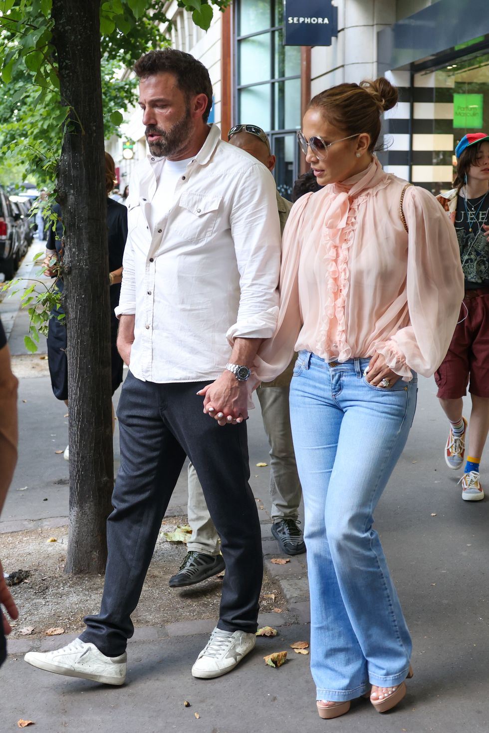 paris, france   july 25 jennifer lopez and ben affleck are seen at a sephora store on july 25, 2022 in paris, france photo by pierre suugc images