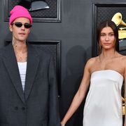canadian singer songwriter justin bieber l and us model hailey bieber arrive for the 64th annual grammy awards at the mgm grand garden arena in las vegas on april 3, 2022 photo by angela  weiss  afp photo by angela  weissafp via getty images