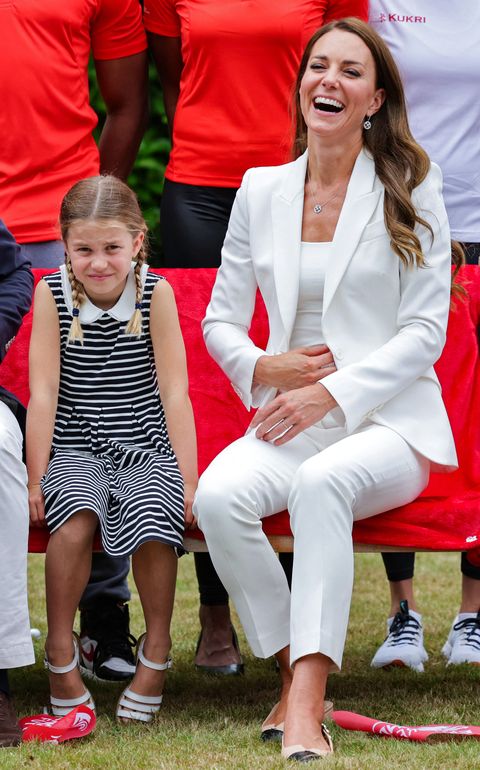 britains catherine, duchess of cambridge r and britains princess charlotte of cambridge l pose for a phograph during a visit to sportsaid house on day five of the commonwealth games in birmingham, central england, on august 2, 2022   the duchess became the patron of sportsaid in 2013, team england futures programme is a partnership between sportsaid, sport england and commonwealth games england which will see around 1,000 talented young athletes and aspiring support staff given the opportunity to attend the games and take a first hand look behind the scenes photo by chris jackson  pool  afp photo by chris jacksonpoolafp via getty images