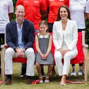 britains princess charlotte of cambridge c, britains prince william, duke of cambridge l and britains catherine, duchess of cambridge r pose for a photograph during a visit to sportsaid house on day five of the commonwealth games in birmingham, central england, on august 2, 2022   the duchess became the patron of sportsaid in 2013, team england futures programme is a partnership between sportsaid, sport england and commonwealth games england which will see around 1,000 talented young athletes and aspiring support staff given the opportunity to attend the games and take a first hand look behind the scenes photo by chris jackson  pool  afp photo by chris jacksonpoolafp via getty images