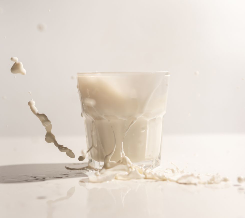 milk splash on white table