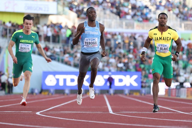 eugene, oregon   july 15 jake doran of team australia, letsile tebogo of team botswana, and yohan blake of team jamaica compete in the men’s 100 meter heats on day one of the world athletics championships oregon22 at hayward field on july 15, 2022 in eugene, oregon photo by carmen mandatogetty images