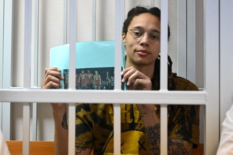 topshot   us wnba basketball superstar brittney griner sits inside a defendants cage during a hearing at the khimki court in the town of khimki outside moscow on july 15, 2022   griner, a two time olympic gold medallist and wnba champion, was detained at moscow airport in february on charges of carrying in her luggage vape cartridges with cannabis oil, which could carry a 10 year prison sentence photo by natalia kolesnikova  afp photo by natalia kolesnikovaafp via getty images