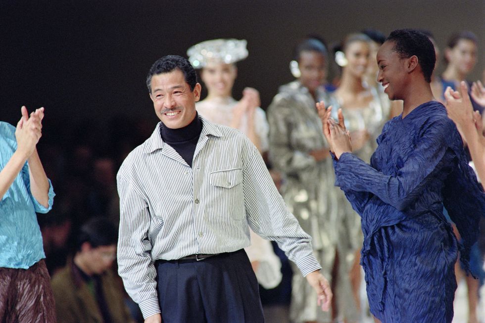 japanese fashion designer issey miyake acknowledges the applause of his models and his public after presenting his 1992 spring summer collection on october 19, 1991 in paris photo by pierre guillaud  afp photo by pierre guillaudafp via getty images
