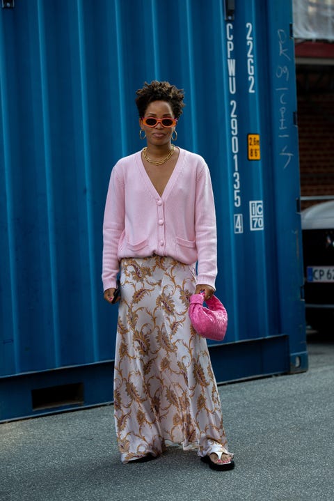 copenhagen, denmark august 10 elizabeth delphine outside ganni wearing pink ganni sweater, paco rabanne maxi skirt, bottega veneta bag and loewe sunglasses during copenhagen fashion week ss21 on august 10, 2020 at copenhagen photolikaumondski dega.