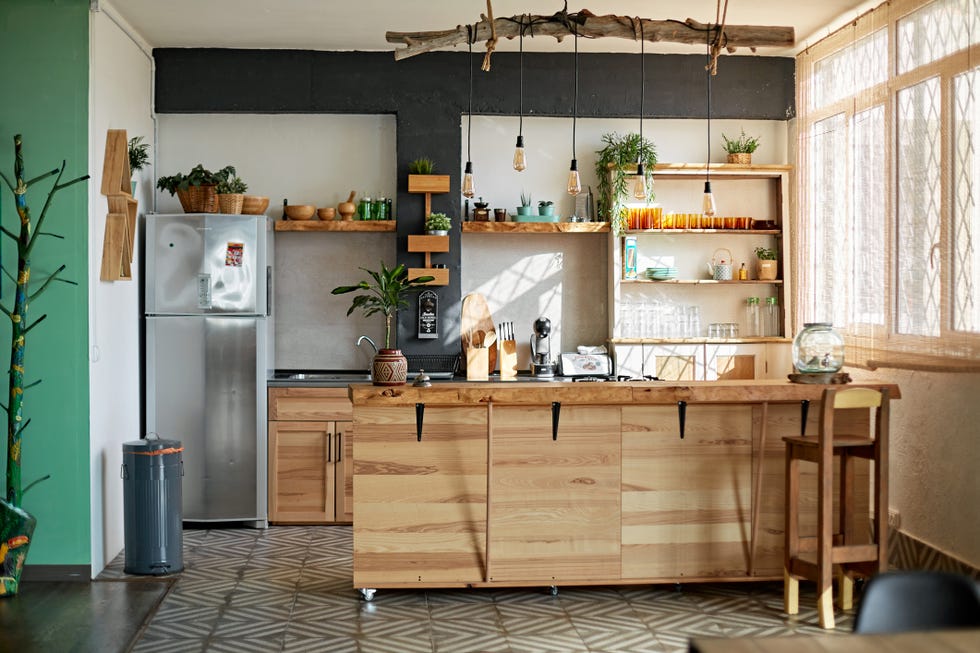 cocina con isla de estilo rústico industrial