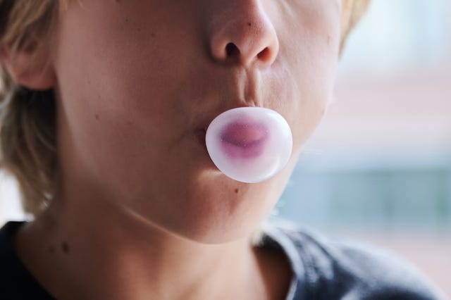 illustration 26 august 2023, berlin a child forms a gum bubble with his mouth posed scene sometimes parents are right with their teachings they have more life experience and thus have one or two good tips at the ready sometimes, however, they are completely off the mark with their wisdom to dpa does chewing gum make your stomach sticky parents sayings in a fact check photo annette riedldpa photo by annette riedlpicture alliance via getty images