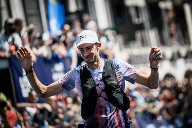 spains kilian jornet celebrates as he crosses the finish line and wins the 19th edition of the ultra trail du mont blanc utmb a 171km trail race crossing france, italy and switzerland in chamonix, south eastern france on august 27, 2022   the spanish ultra trail star kilian jornet was victorious in the fourth ultra trail du mont blanc utmb of his career, setting a new record time of under twenty hours photo by jeff pachoud  afp photo by jeff pachoudafp via getty images