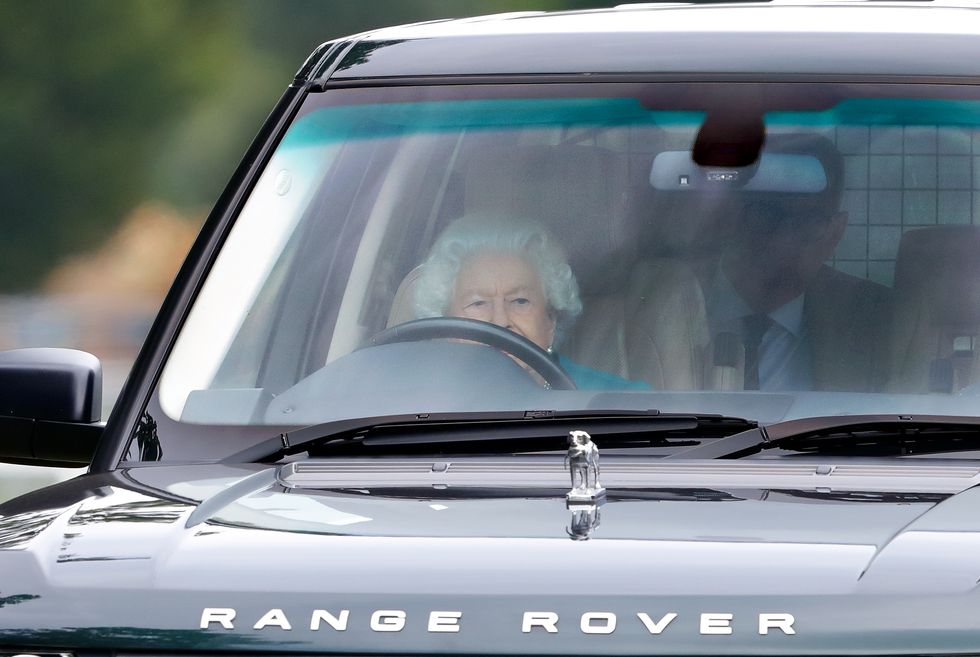 windsor, united kingdom   july 01 embargoed for publication in uk newspapers until 24 hours after create date and time queen elizabeth ii seen driving her range rover car as she attends day 1 of the royal windsor horse show in home park, windsor castle on july 1, 2021 in windsor, england photo by max mumbyindigogetty images