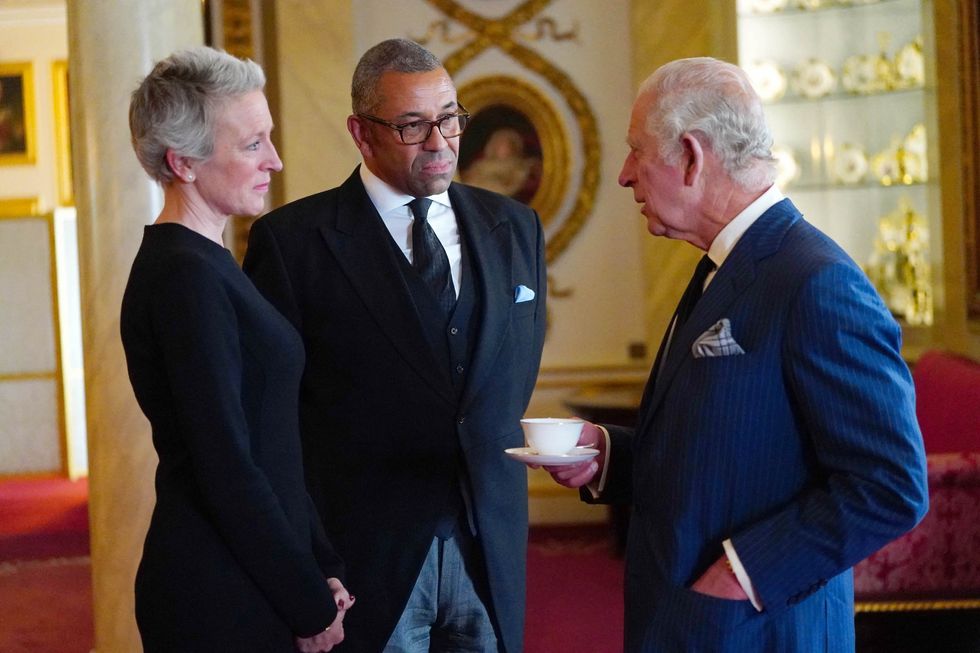britain's king charles iii r speaks with britain's foreign secretary james cleverly c during a reception with realm high commissioners and their spouses in the bow room of buckingham palace in london on september 11, 2022 photo by victoria jones  pool  afp photo by victoria jonespoolafp via getty images