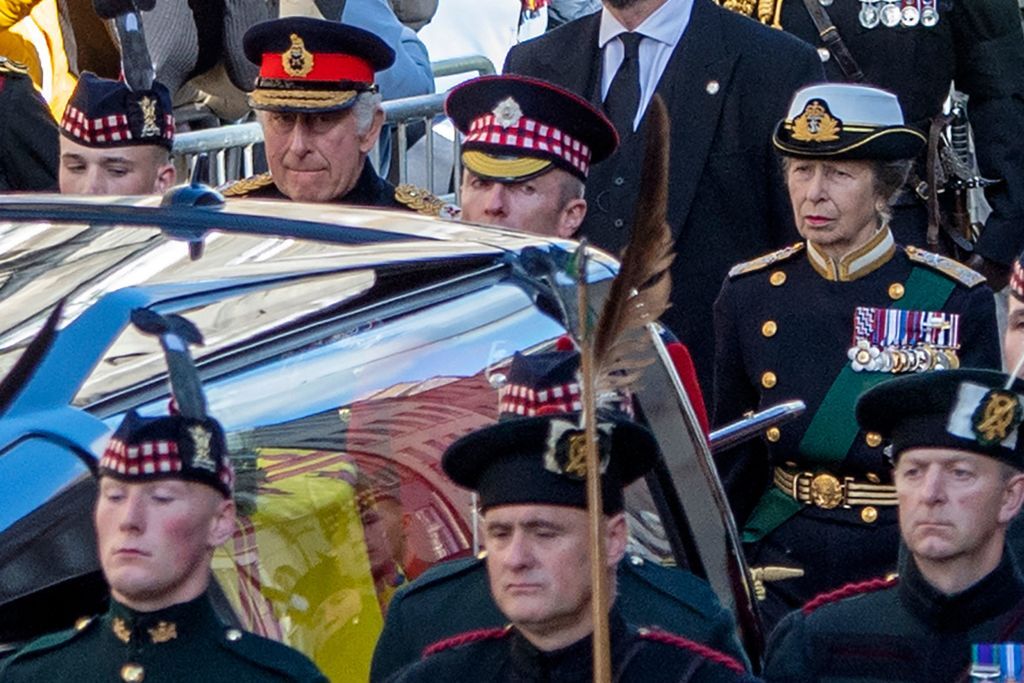 britains king charles iii back, 2nd r, and the britains princess anne, princess royal r, walk behind the coffin of britains late queen elizabeth ii, draped with the royal standard of scotland, during the procession from the palace of holyroodhouse to st giles cathedral in edinburgh, on september 12, 2022   mourners will on september 12, 2022 get the first opportunity to pay respects before the coffin of queen elizabeth ii, as it lies in an edinburgh cathedral where king charles iii will preside over a vigil photo by lesley martin  pool  afp photo by lesley martinpoolafp via getty images