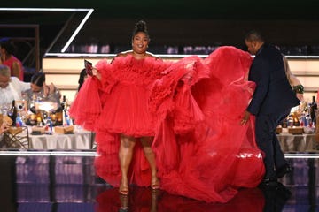 us actor and host kenan thompson r and us singer songwriter lizzo present the award for outstanding supporting actor in a comedy series onstage during the 74th emmy awards at the microsoft theater in los angeles, california, on september 12, 2022 photo by patrick t fallon  afp photo by patrick t fallonafp via getty images