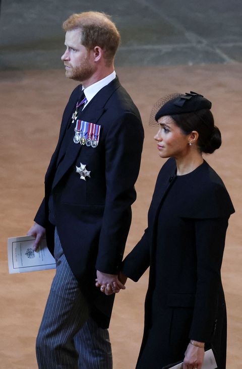 britains prince harry, duke of sussex and meghan, duchess of sussex leave after a service for the reception of queen elizabeth iis coffin at westminster hall, in the palace of westminster in london on september 14, 2022, where the coffin will lie in state   queen elizabeth ii will lie in state in westminster hall inside the palace of westminster, from wednesday until a few hours before her funeral on monday, with huge queues expected to file past her coffin to pay their respects photo by phil noble  pool  afp photo by phil noblepoolafp via getty images