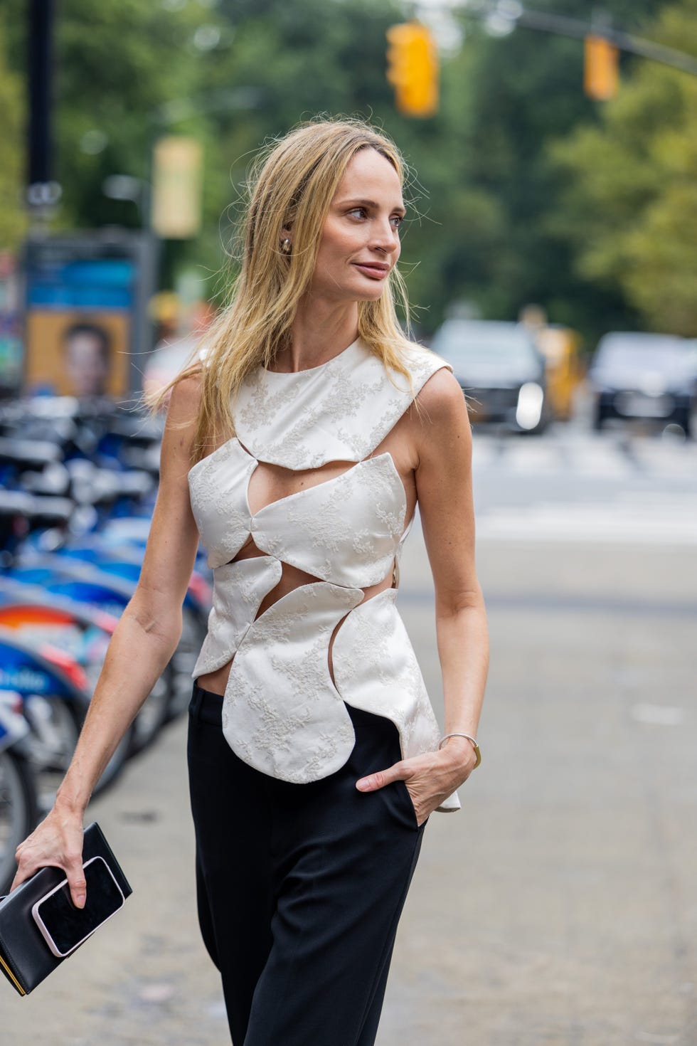 new york, new york   september 12 lauren santo domingo wearing white ripped top, black pants outside carolina herrera on september 12, 2022 in new york city photo by christian vieriggetty images
