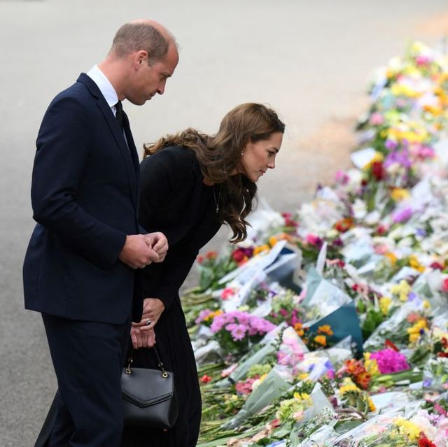 britains prince william, prince of wales and britains catherine, princess of wales look at floral tributes outside norwich gate on the sandringham estate in sandringham, eastern england, on september 15, 2022, following the death of queen elizabeth ii   as preparations build for next weeks state funeral, prince william and his wife catherine    the new prince and princess of wales    visit sandringham, where the queen used to spend christmas photo by daniel leal  afp photo by daniel lealafp via getty images