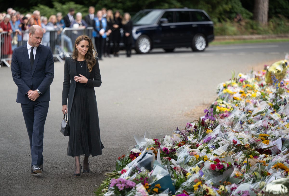Royal family walk behind Queen Elizabeth II's coffin in Procession from  Buckingham Palace